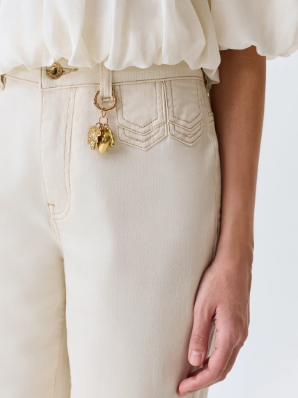 Прямые джинсы с металлическим декором