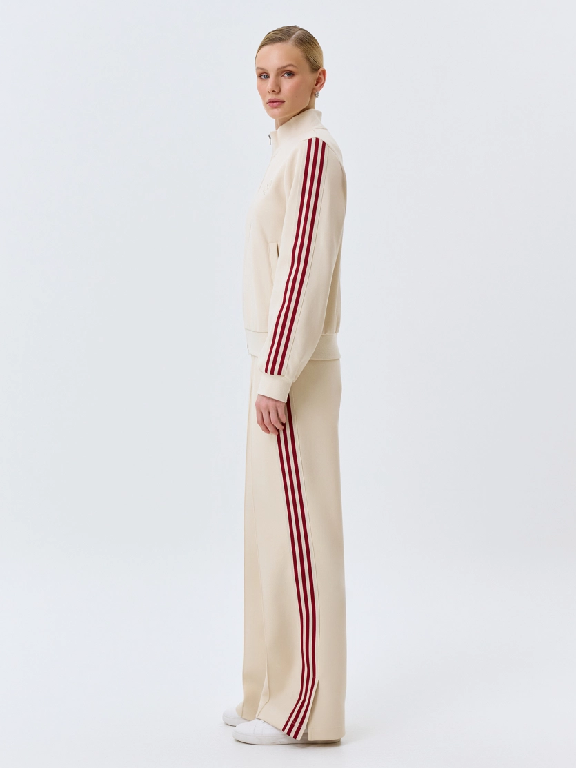 Трикотажные брюки с контрастными лампасами