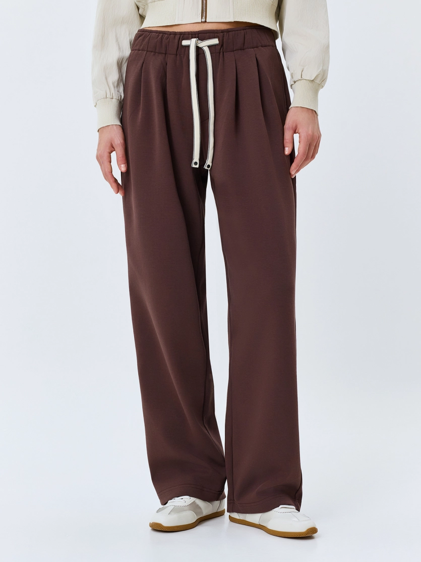 Широкие брюки багги со складками