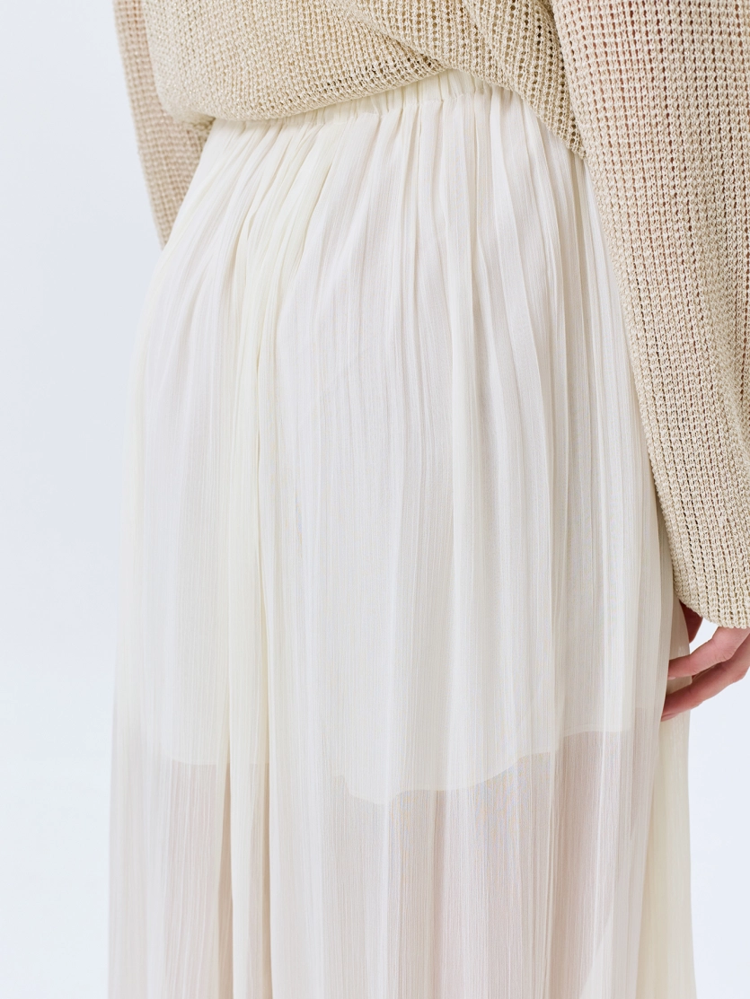 Свободные полупрозрачные брюки 