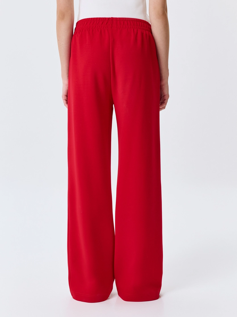 Яркие трикотажные брюки 