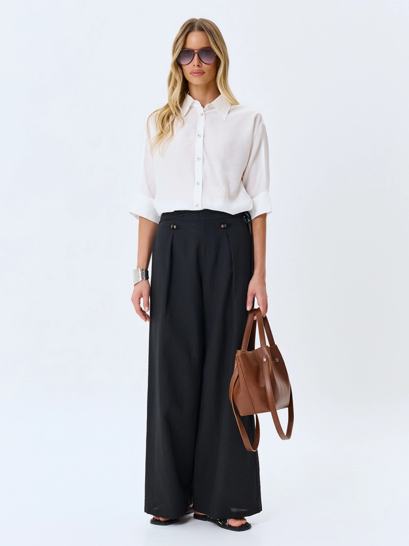 Широкие брюки с акцентным поясом