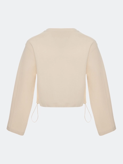 Укороченный джемпер с рельефными швами