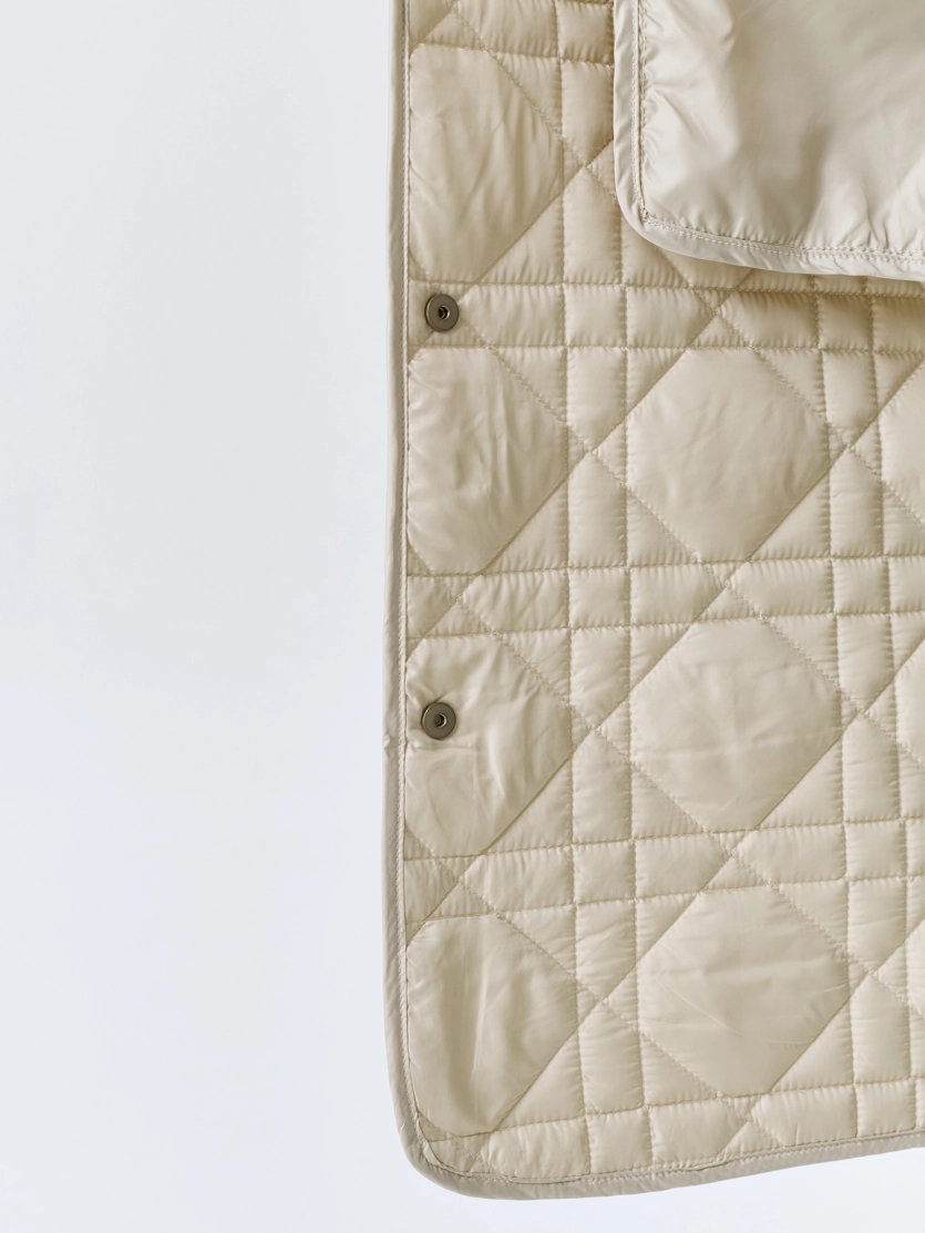 Укороченное стеганое пальто