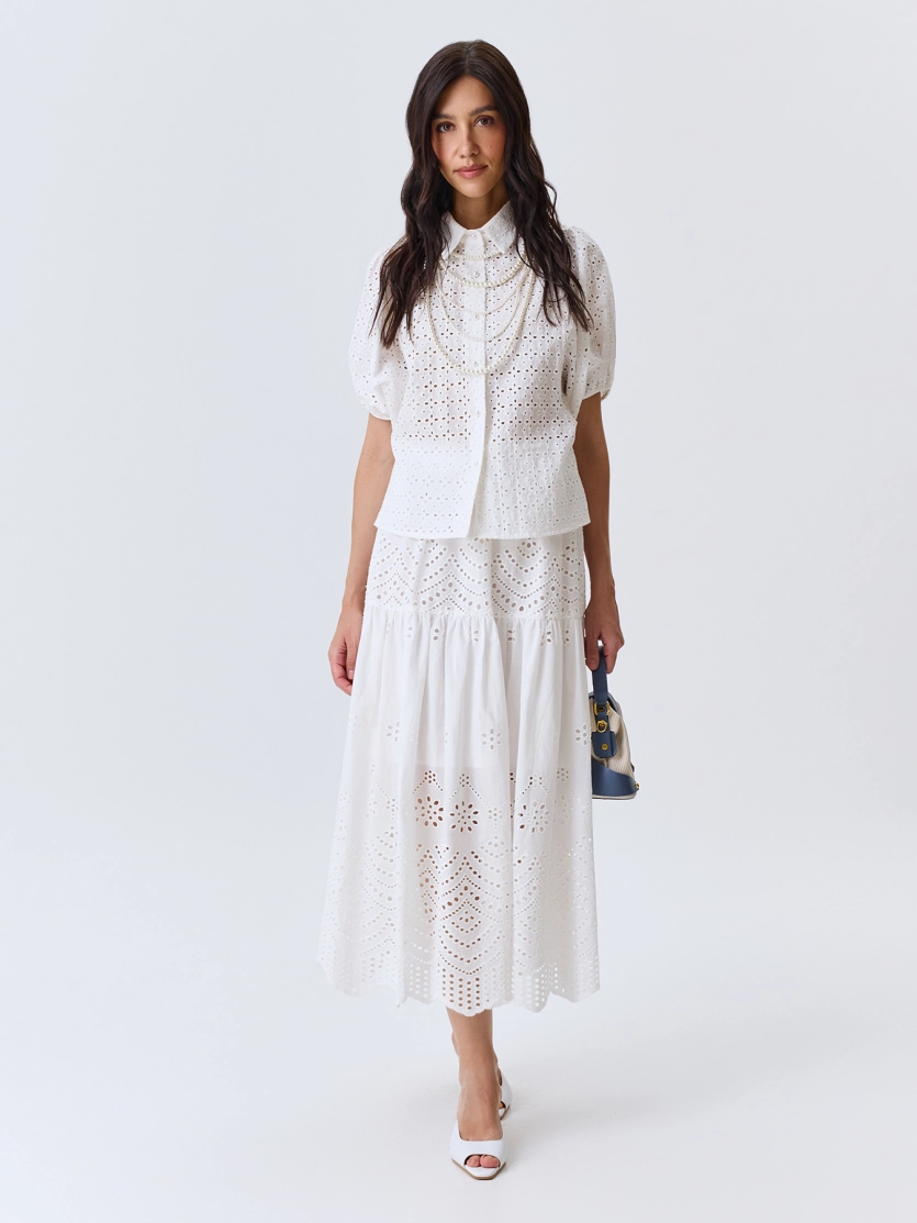 Ажурная блузка с объемными рукавами