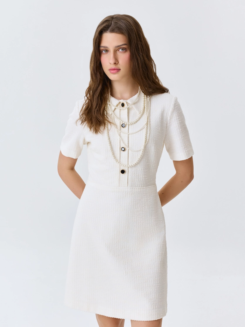 Трикотажное платье с металлическими пуговицами