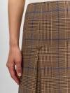 Юбка в клетку со складками