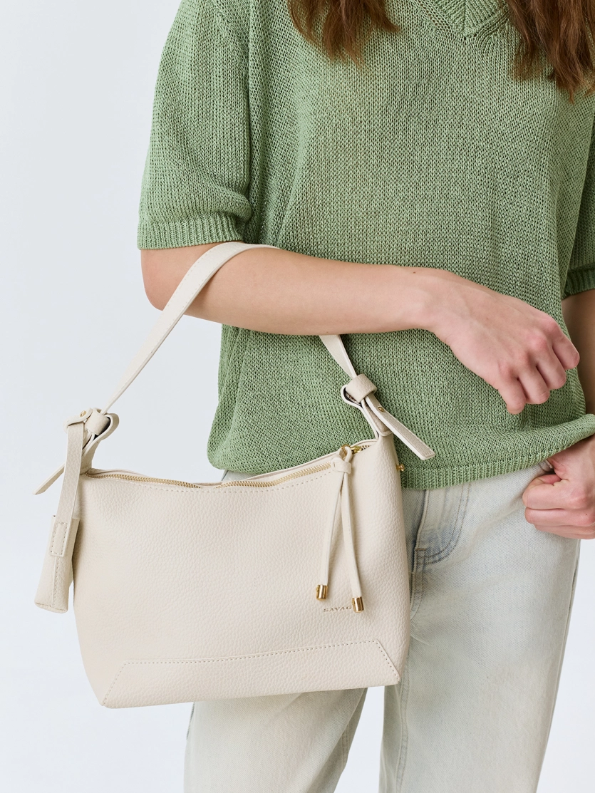 Сумка из эко кожи с обвесом