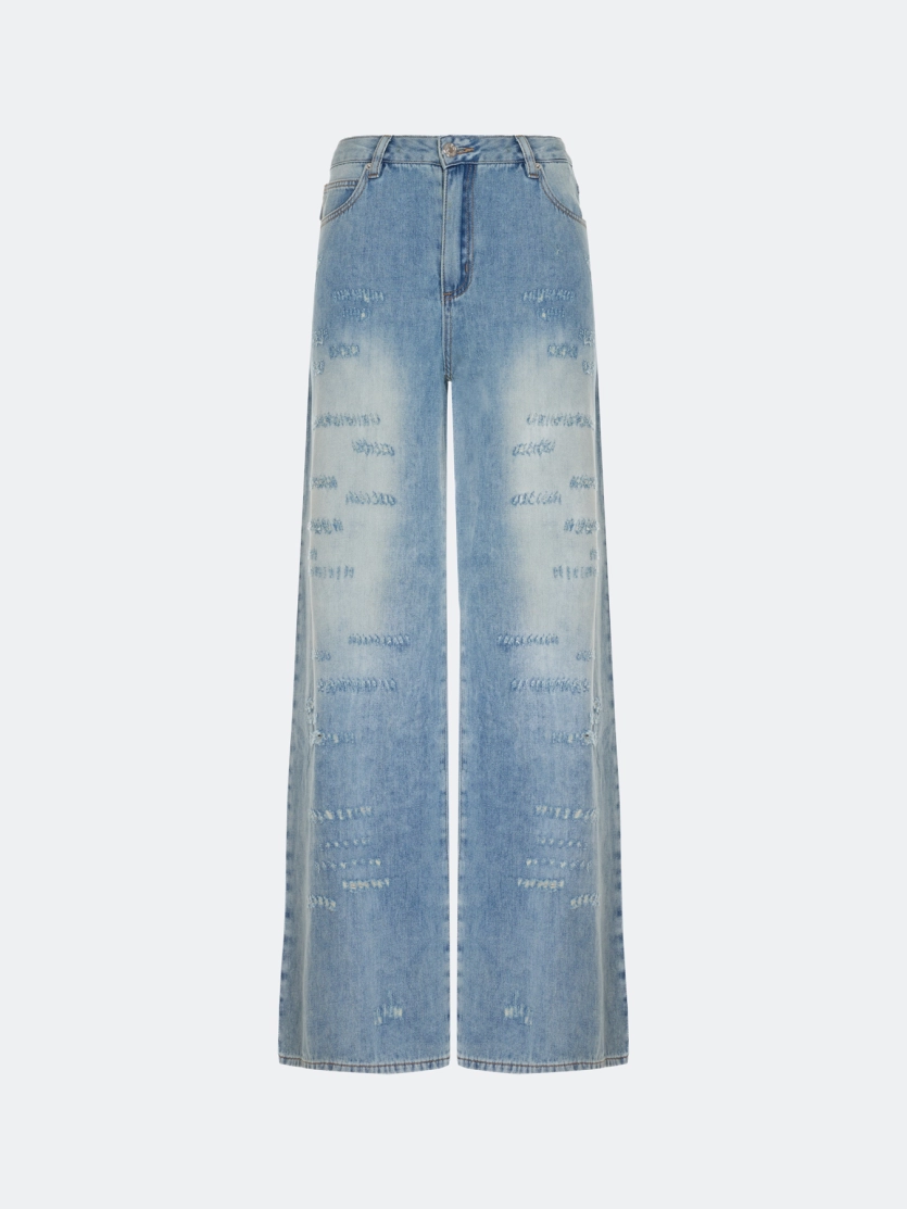 Широкие джинсы с акцентными дестроями