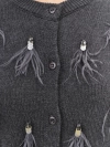 Вязаный кардиган с декоративными перьями и кристаллами