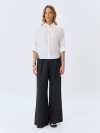 Широкие брюки с акцентным поясом