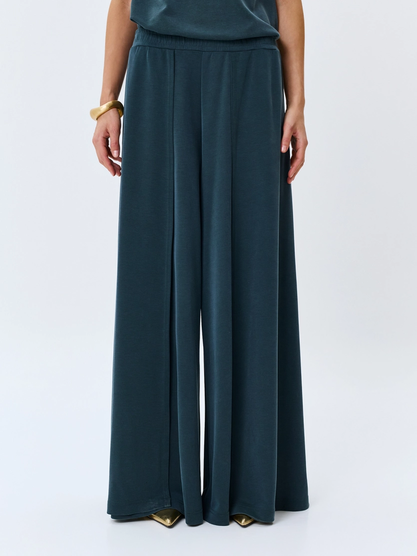 Брюки палаццо с высокими разрезами 
