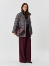 Удлинённый пуховик с декоративной тесьмой